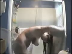 After having wild sex, my gorgeous large-titted hottie was in the shower.